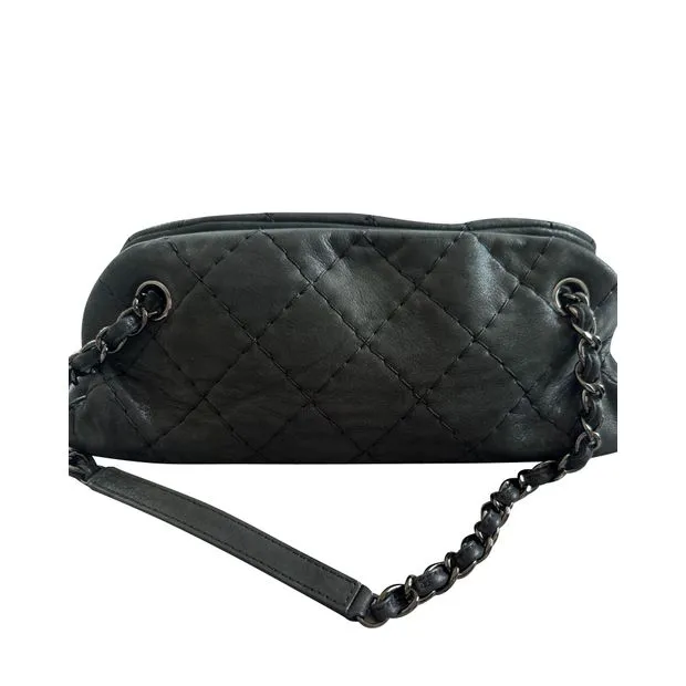 CHANEL Just Mademoiselle Mini Bowler Bag in Iridescent Black Leather