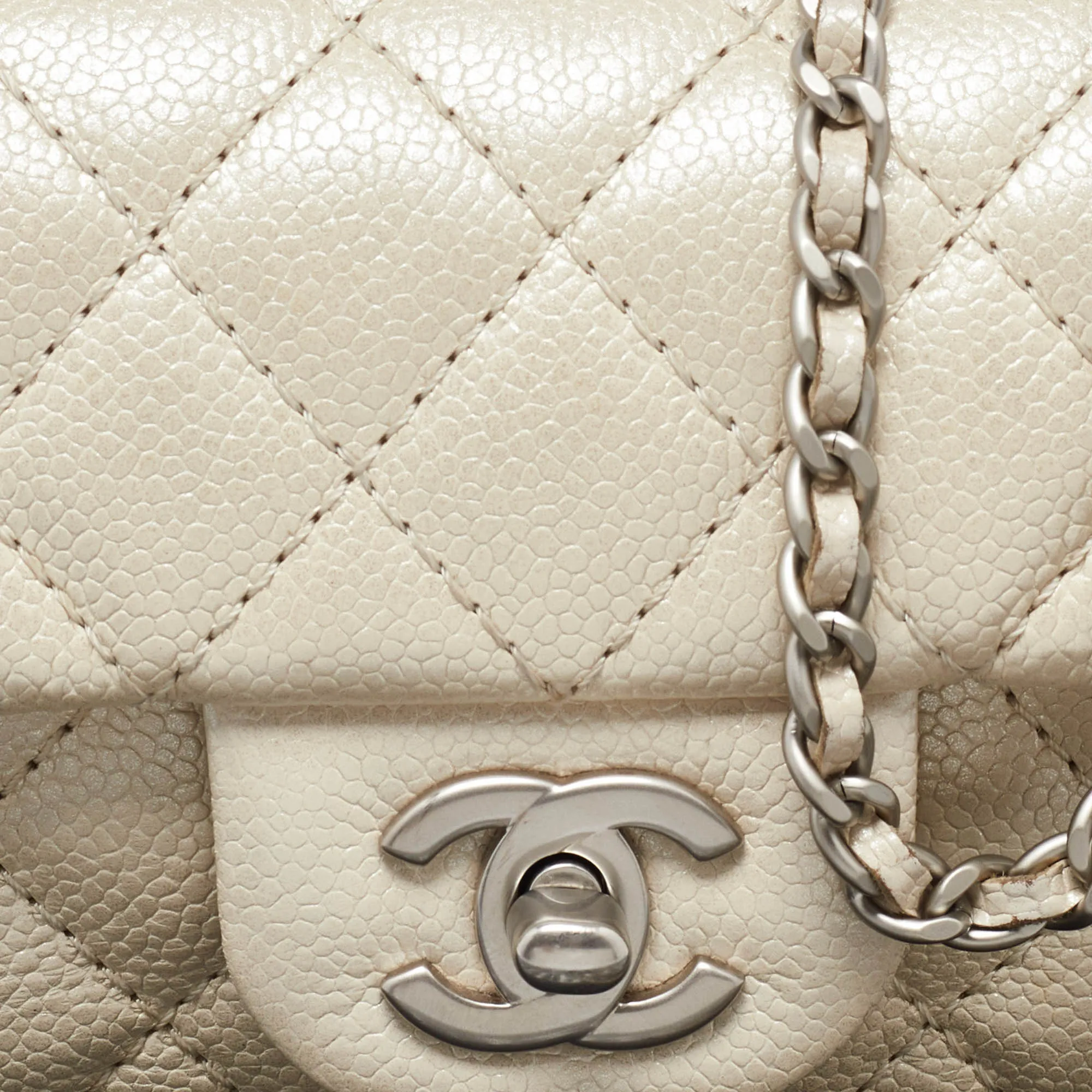 CHANEL Pearl Beige Quilted Caviar Leather New Mini Classic Flap Bag